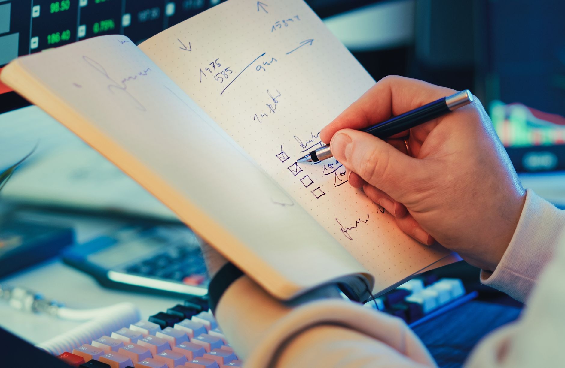 a marketer at a bright office desk comparing a ChatGPT answer on one monitor to a Google AI Overview on another, over-th